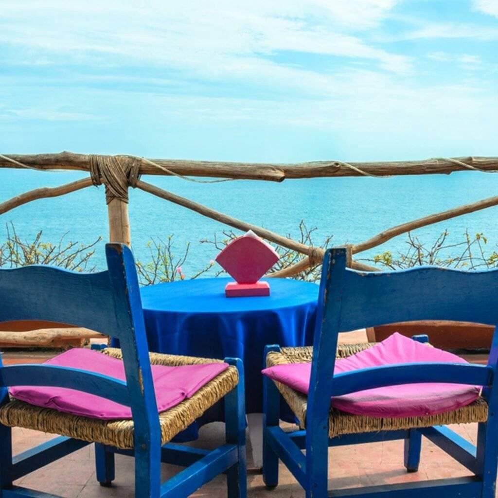 Balcony Simple rustic chairs and tables are great ideas to explore in indian balcony designs