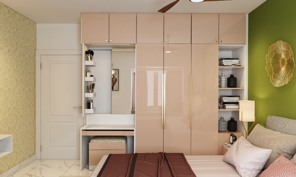 Bedroom wardrobe design finished in pink high gloss laminate with attached dresser unit and open shelves
