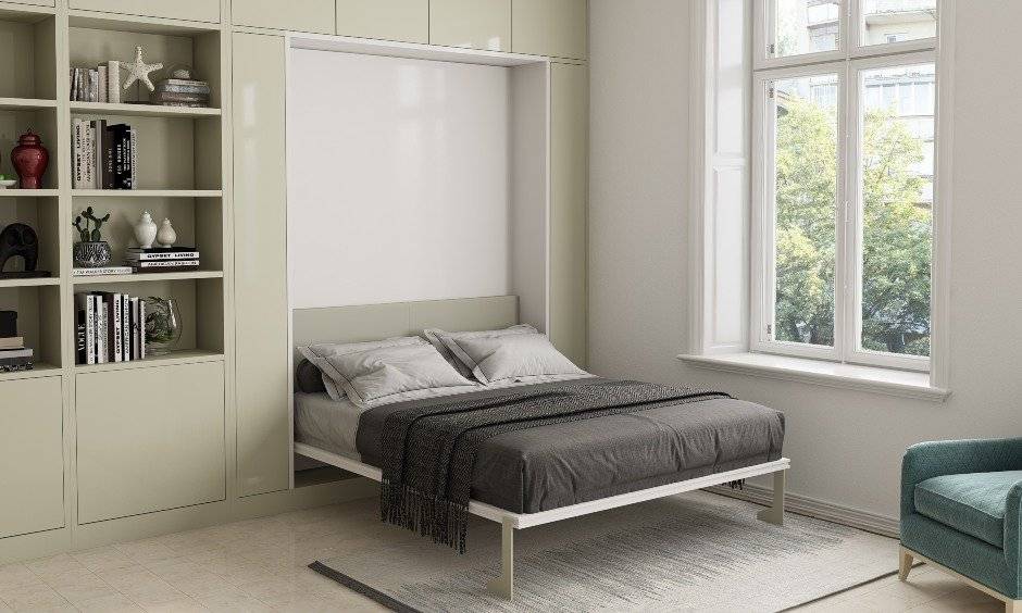 Bedroom designed with space saving foldable muphy bed in small indian homes