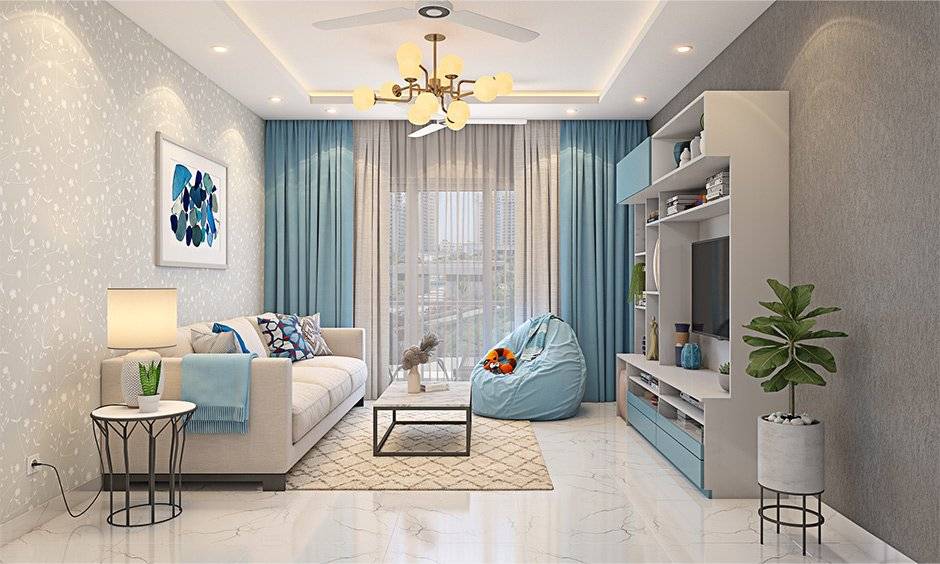 Decorate a rectangular living room with curtains, throws and colourful laminates that can liven it up dramatically
