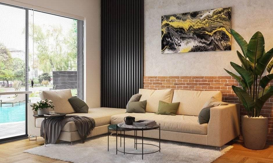 Living room furniture in room interior design with sofa and floor mounted bookshelf for storage options as part of the tv unit