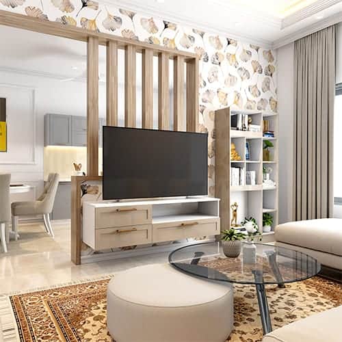 Kolkata interior decorators designed the living room with a corner bookshelf