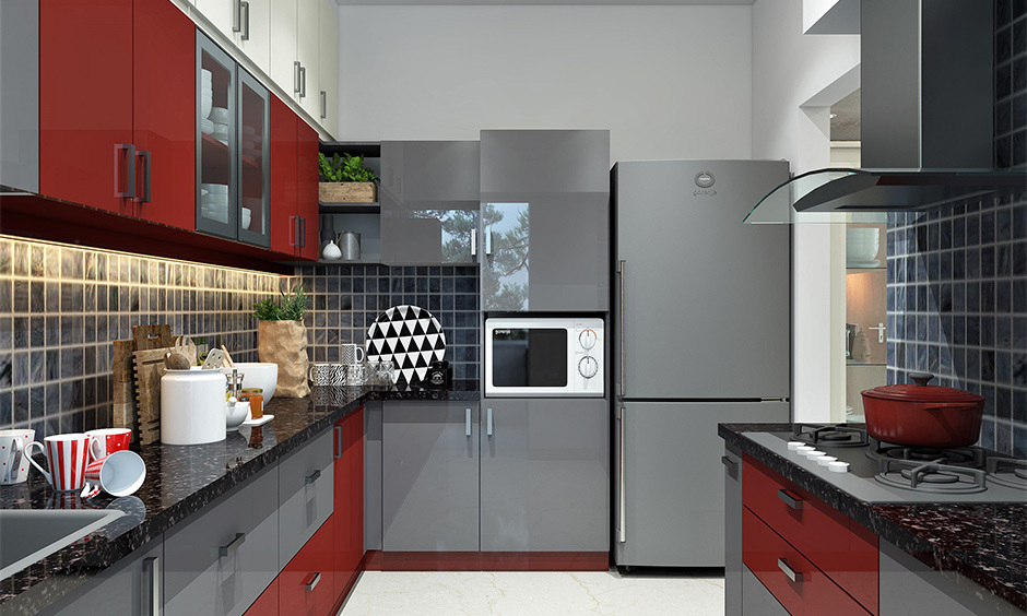 Kitchen with a variety of granite slab colours, from light whites to dark blacks, enhancing the space with depth and style.