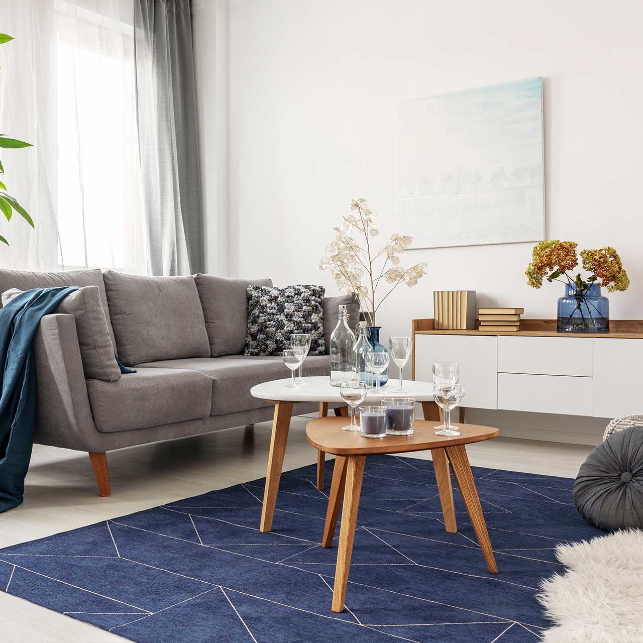 Living room interior which has pretty rugs to keep your feet warm