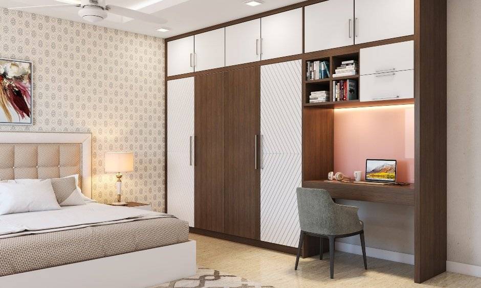 Wardrobe design features a 4-door wardrobe with an attached study-cum-dressing unit