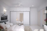 Wooden wardrobe design of white colour with liftable cupboards on the top and a wooden wardrobe with mirror